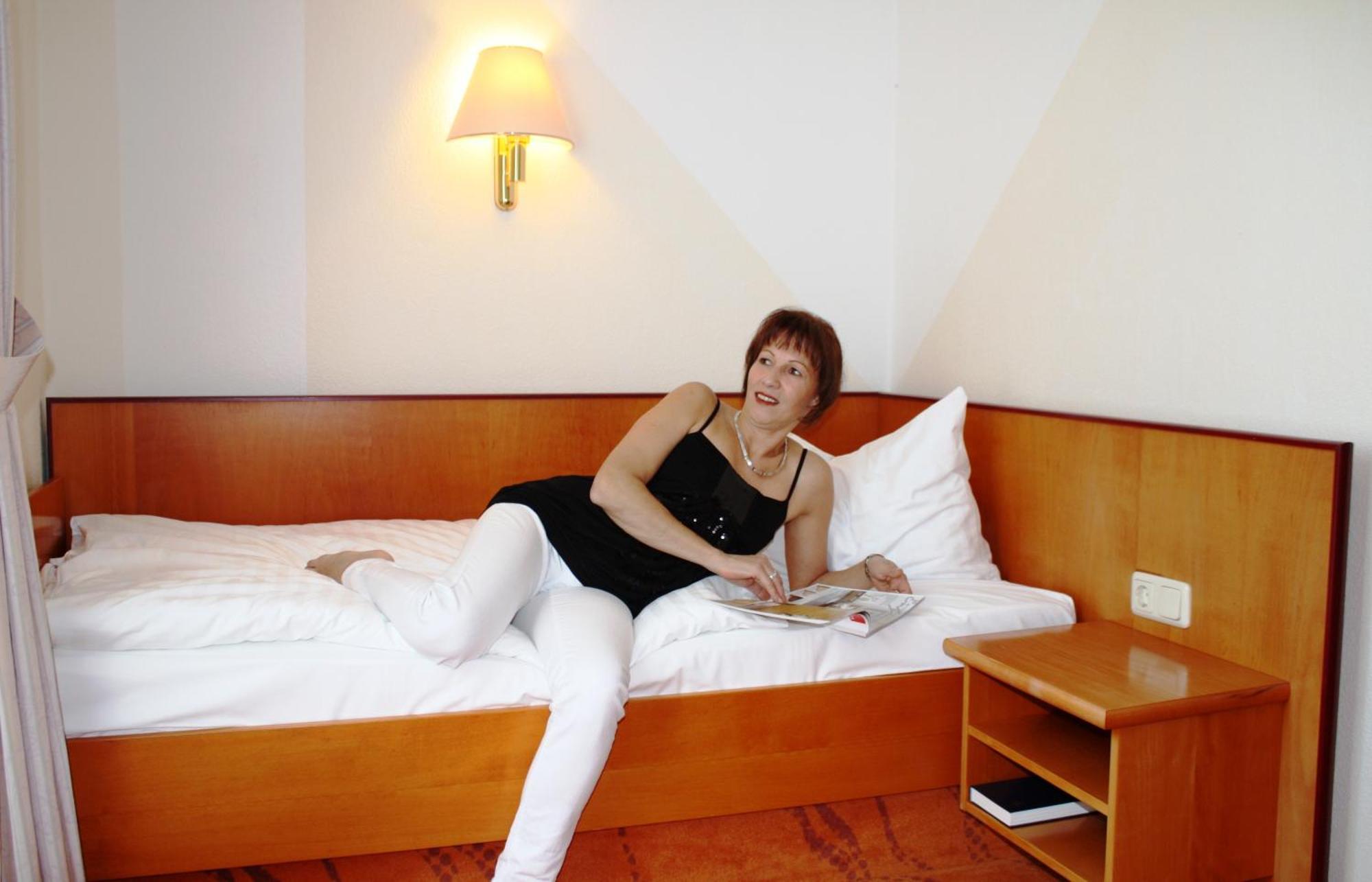 Carmina Am Hotel